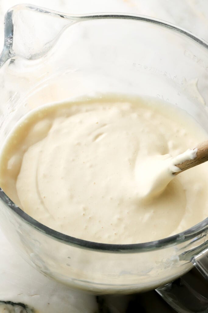 sponge cake batter done, folded with rubber spatula in a glass mixer bowl