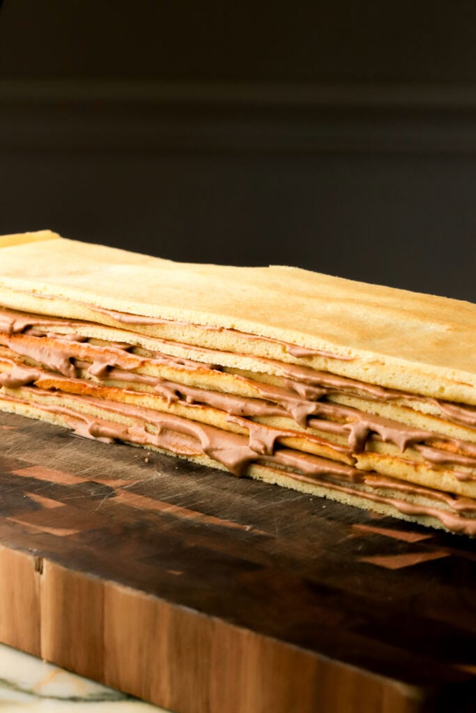 cake full assembled on a wooden board