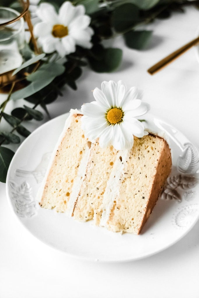 slice of lemon poppyseed cake with a flower
