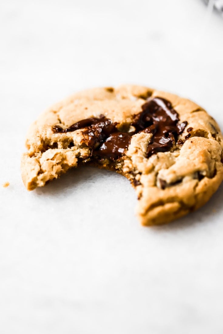 peanut butter cookie with chocolate pools bite shot