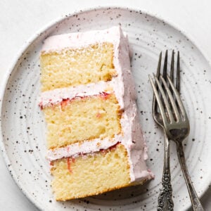 slice of a vanilla 6 inch cake with rhubarb frosting