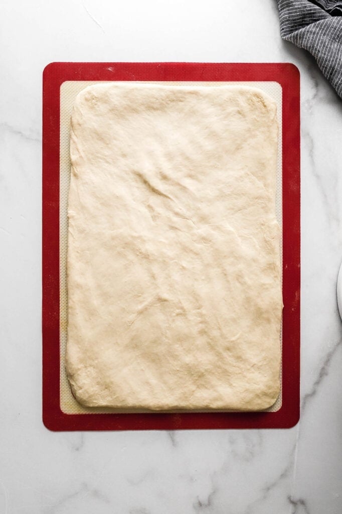 stretch the dough out into a rectangle