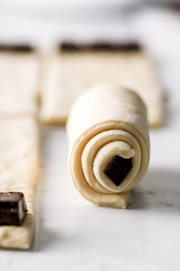 roll the dough around the chocolate