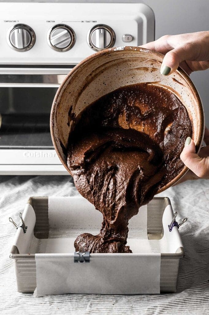 spread brownie batter into pan