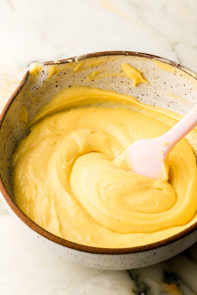 finished pastry cream in bowl with a spatula