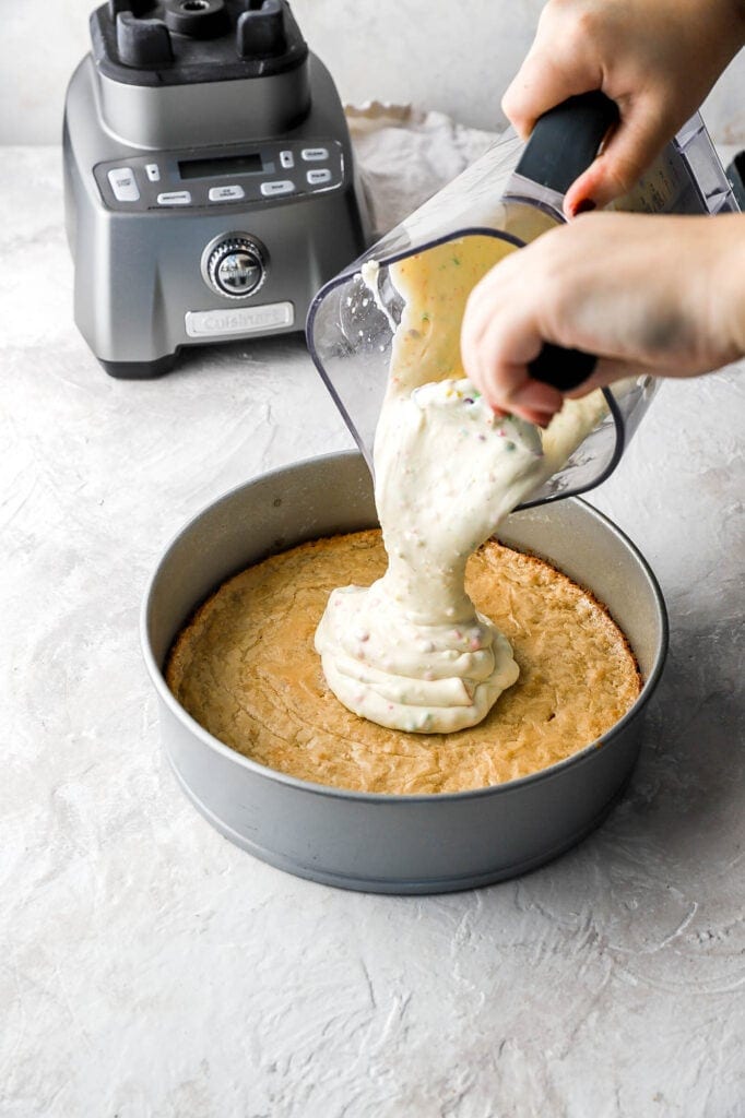 spread cheesecake filling on top of cooled blondies