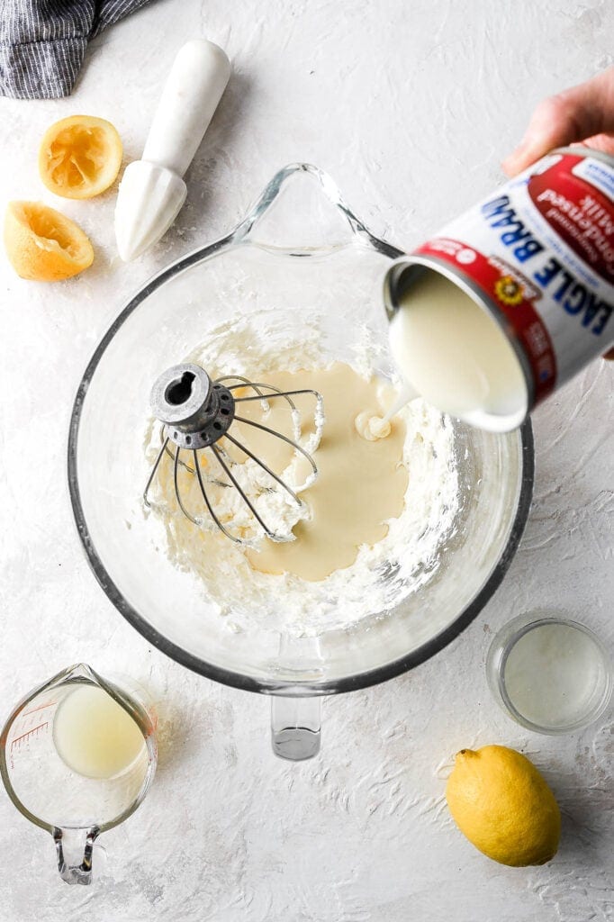 whip the cream cheese add the eagle brand sweetened condensed milk