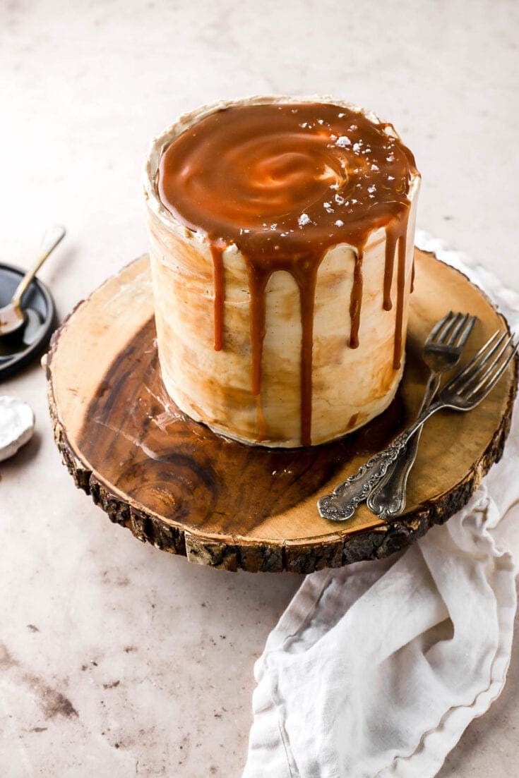 layer cake with vanilla buttercream and bourbon salted caramel sauce