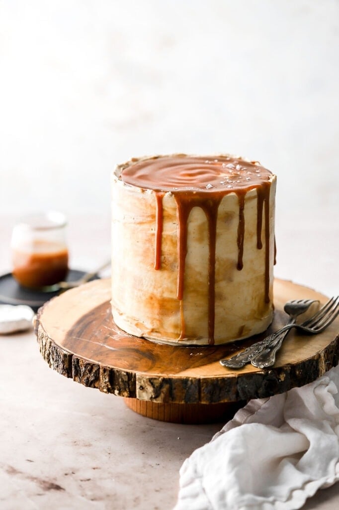 layer cake with vanilla buttercream and bourbon salted caramel sauce