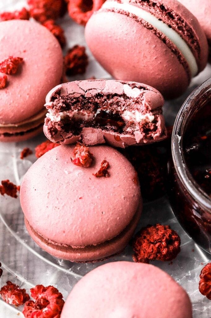 raspberry macarons with white chocolate ganache and raspberry jam