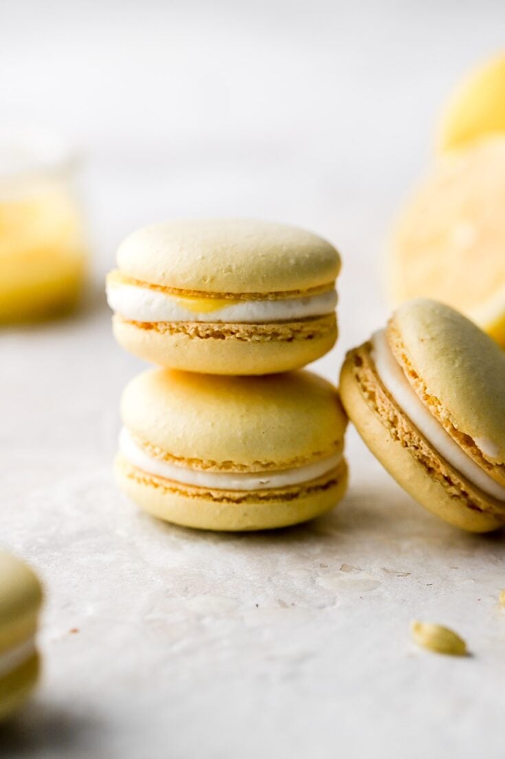 lemon macarons with cream cheese frosting and lemon curd
