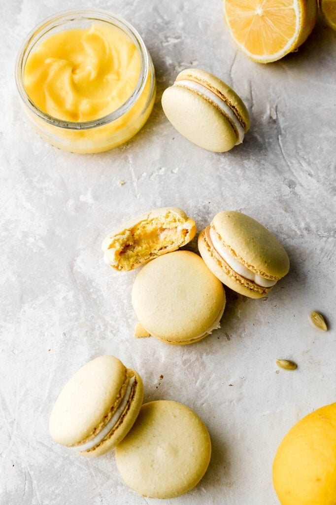 lemon macarons with cream cheese frosting and lemon curd