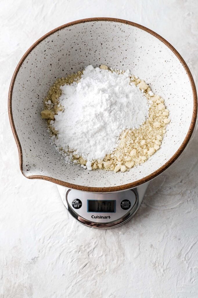 weight out almond flour and powdered sugar