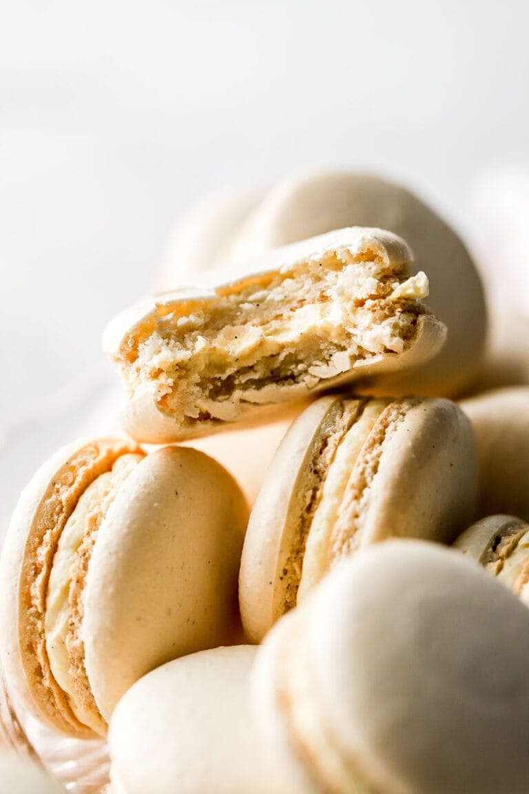 vanilla bean macarons with bite taken out