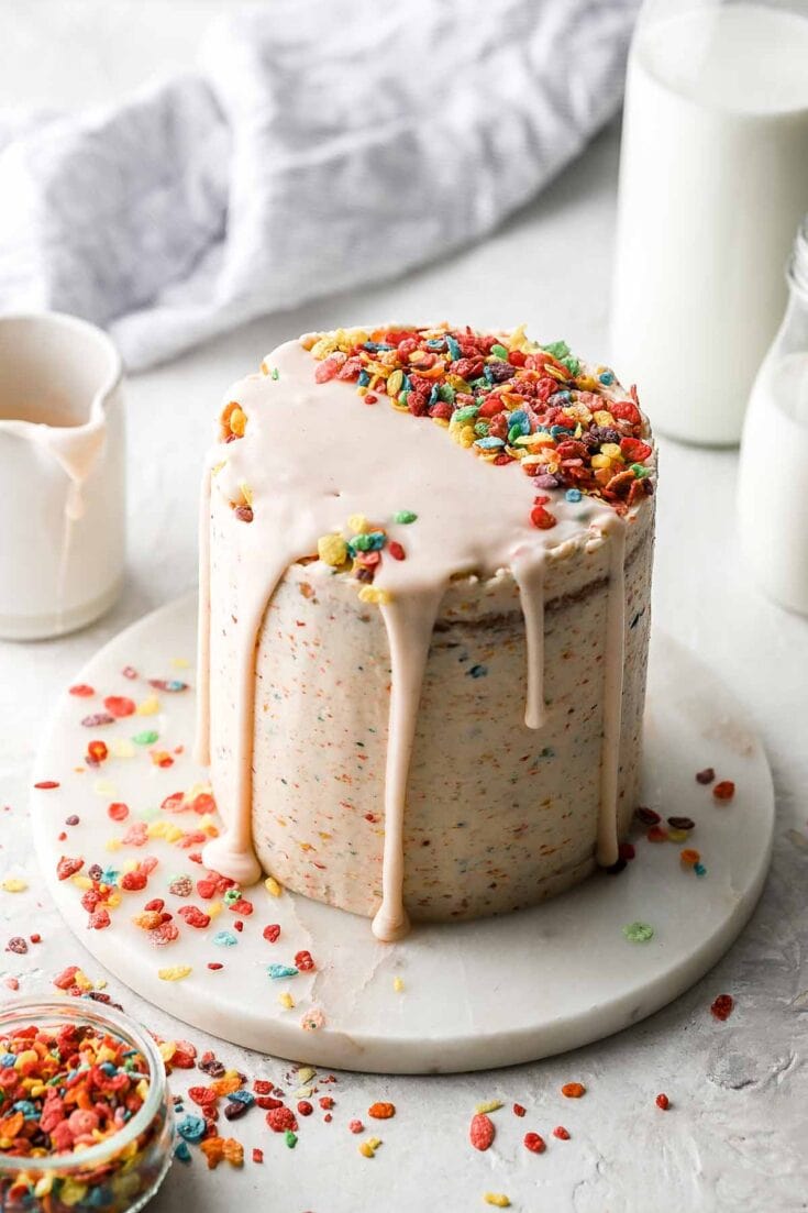 fruity pebble cake with cereal milk drizzle