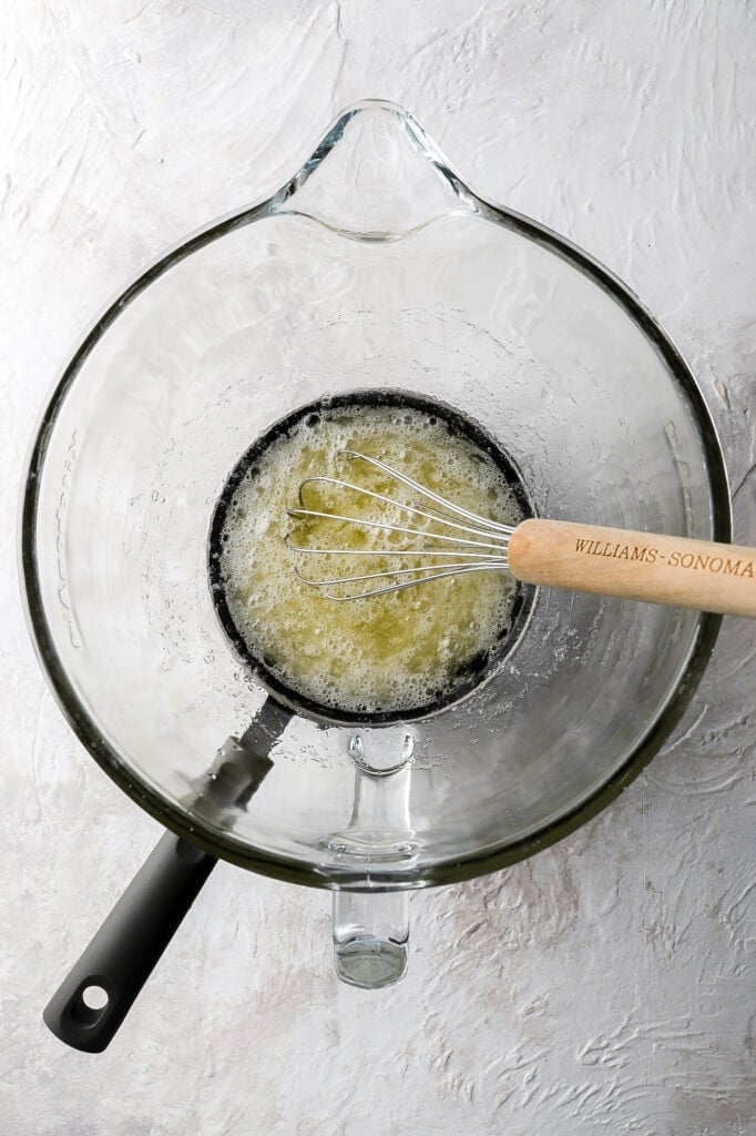 egg whites and sugar cooking over a double boiler