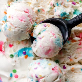 no churn cotton candy ice cream with sprinkles and a scooper