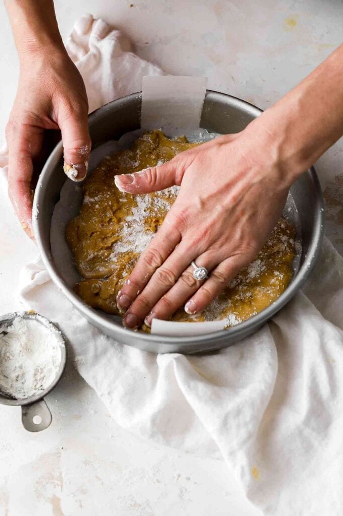 use flour to spread the batter in the pan