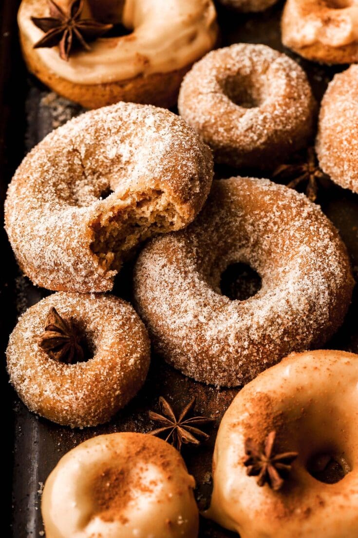 apple cider donuts with bite taken out