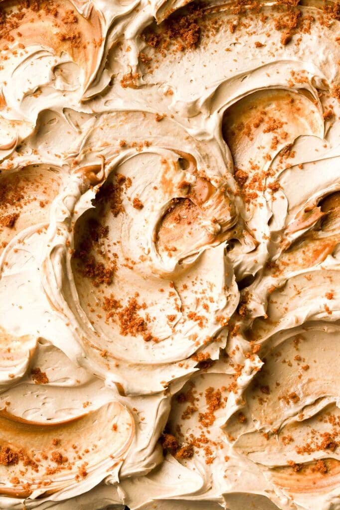 swirls of buttercream with cookie crumbs