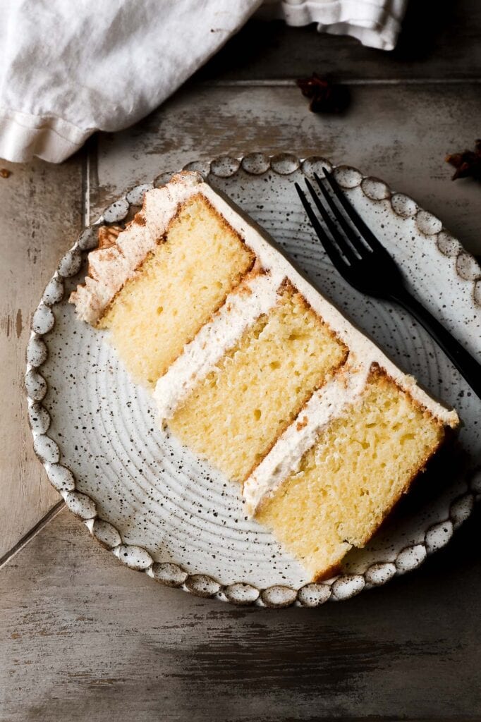 slice of vanilla chai cake on a plate