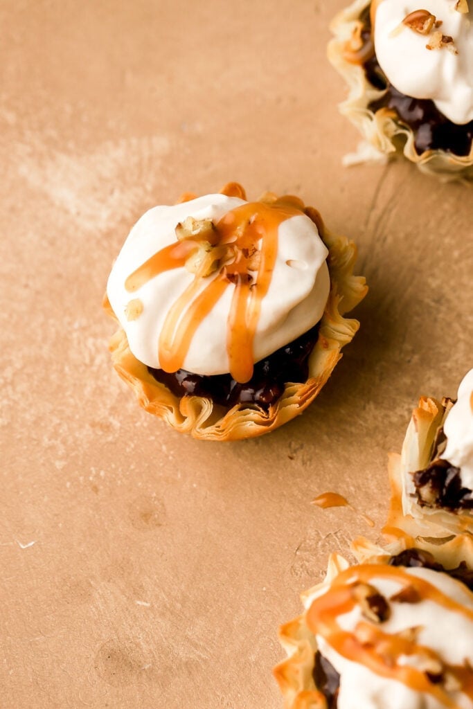 chocolate praline pies with salted caramel on top