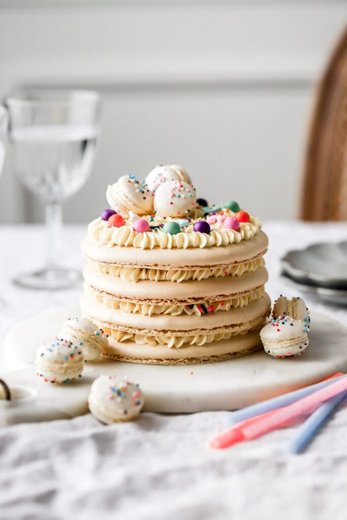 https://baranbakery.com/wp-content/uploads/2021/12/macaron-birthday-cake-2-1-683x1024.jpg