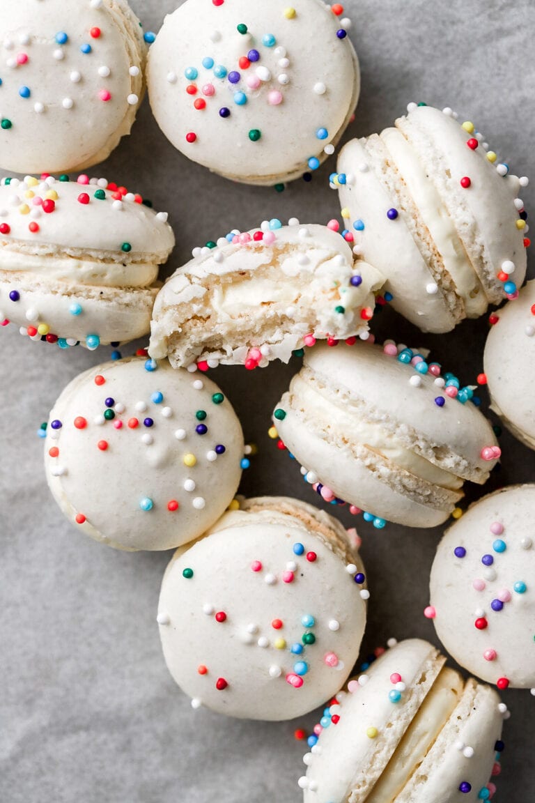 mini macarons with sprinkles and a bite taken out