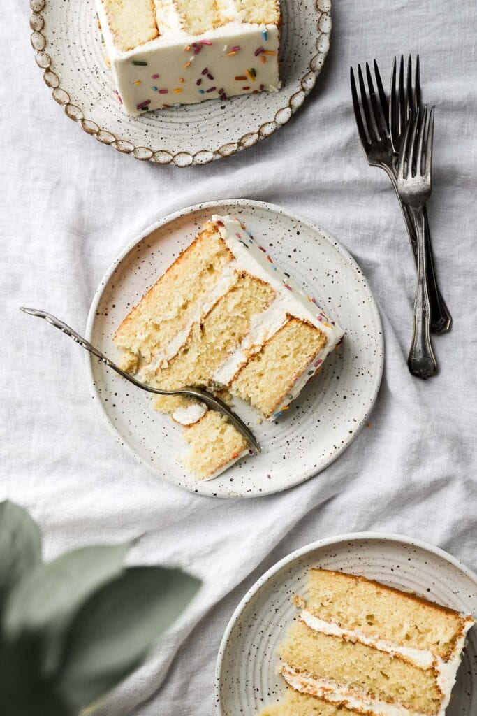 slice of vanilla cake with vanilla buttercream