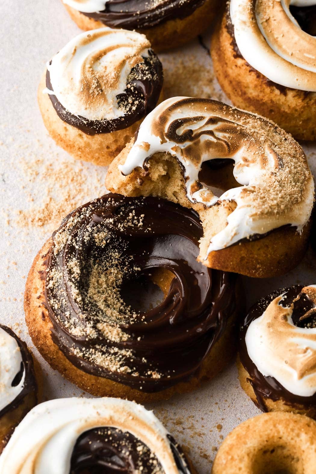 s'mores donuts with chocolate ganache and marshmallow fluff