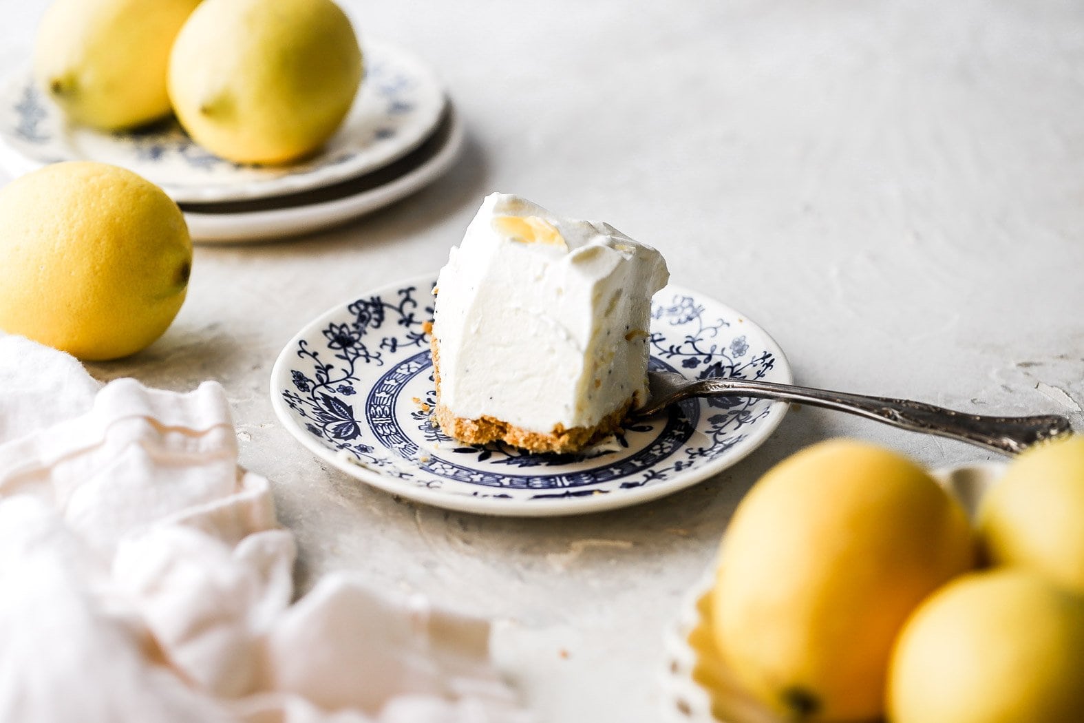 slice of lemon poppy seed cheesecake