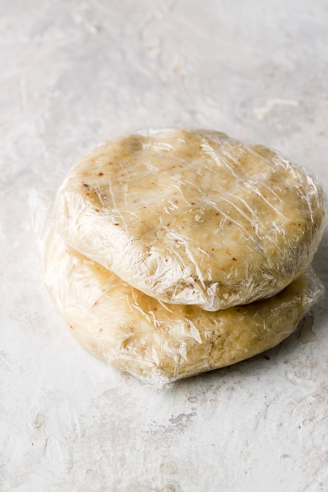 split dough in two, press them together and refrigerate
