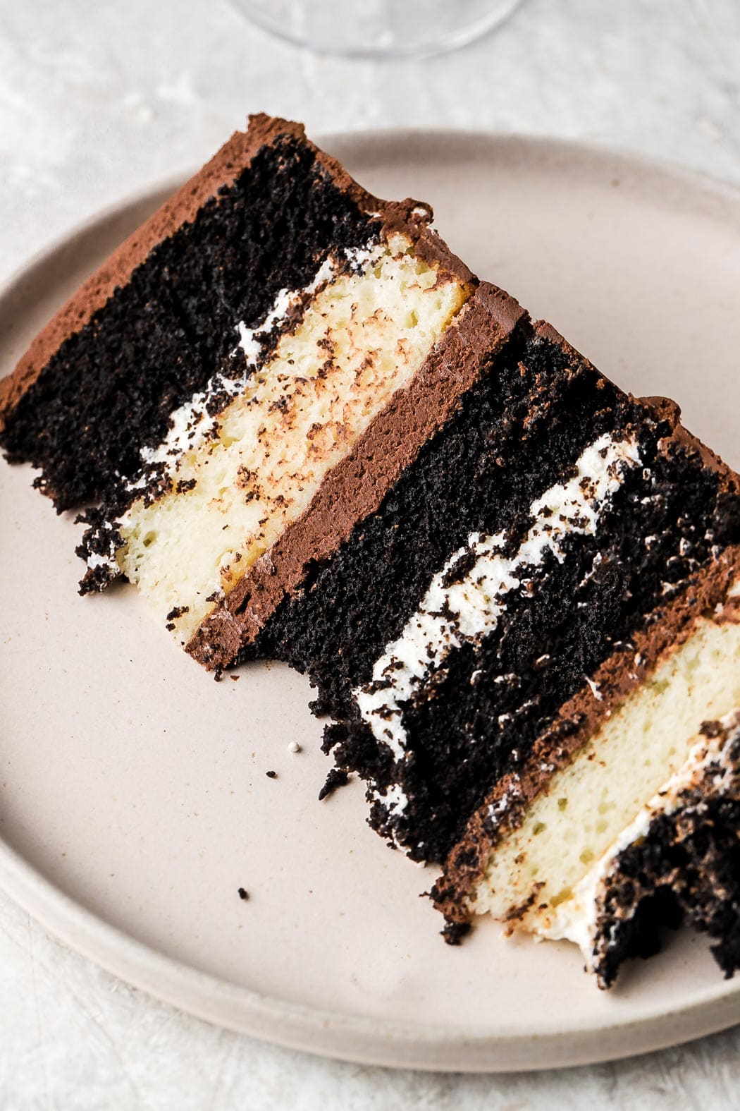 slice of tuxedo cake with 11 layers