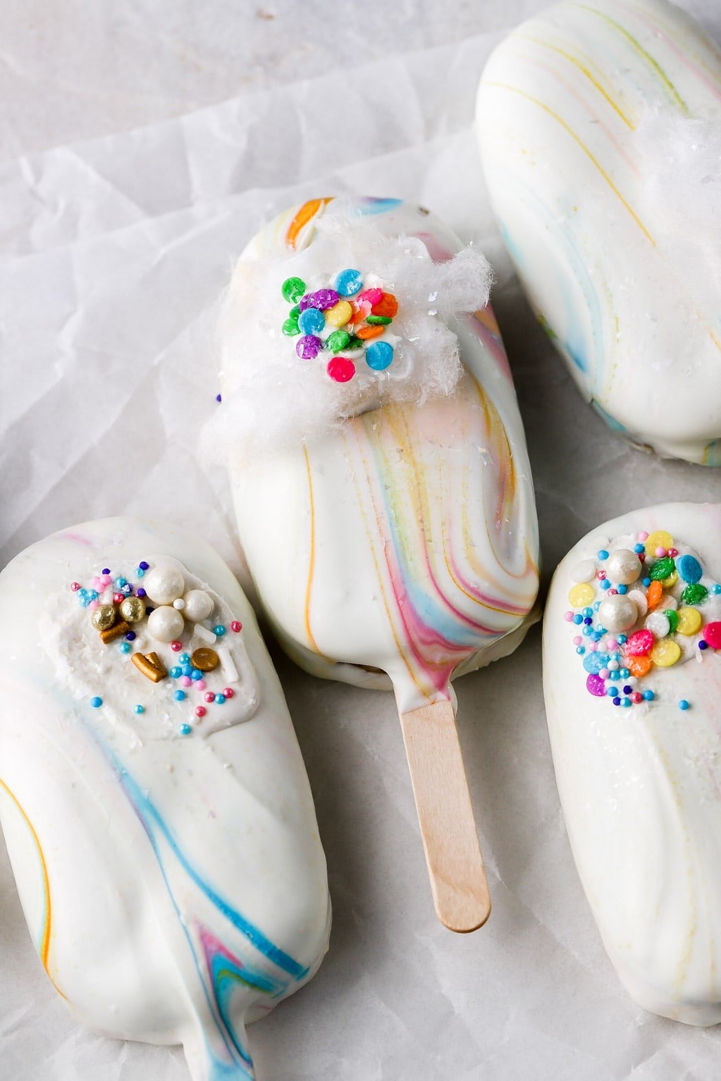 rainbow cakesicles with sprinkles