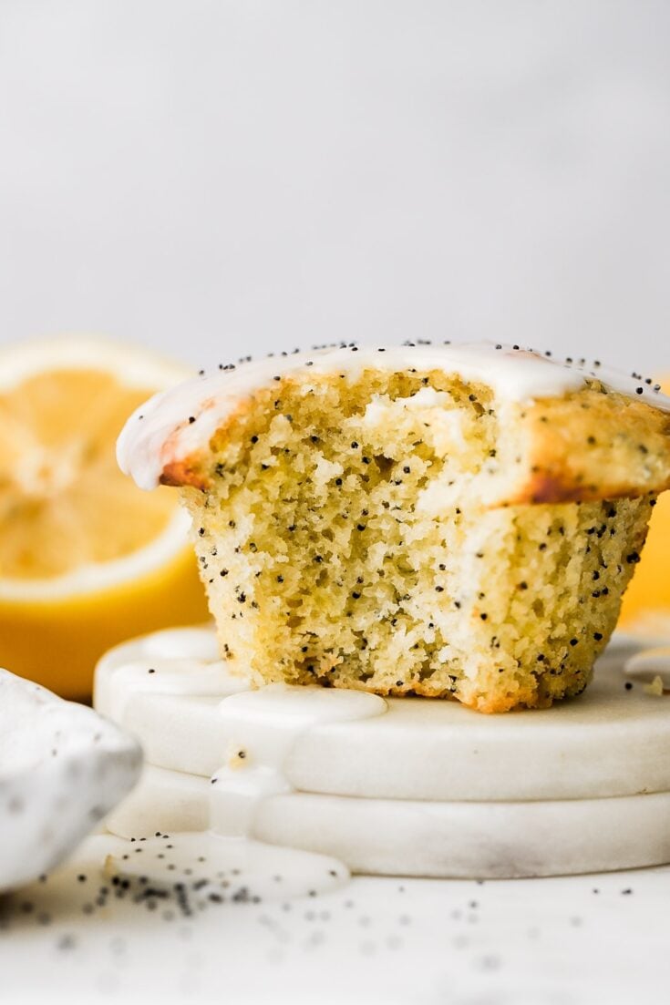 lemon poppy seed muffins with a bite taken