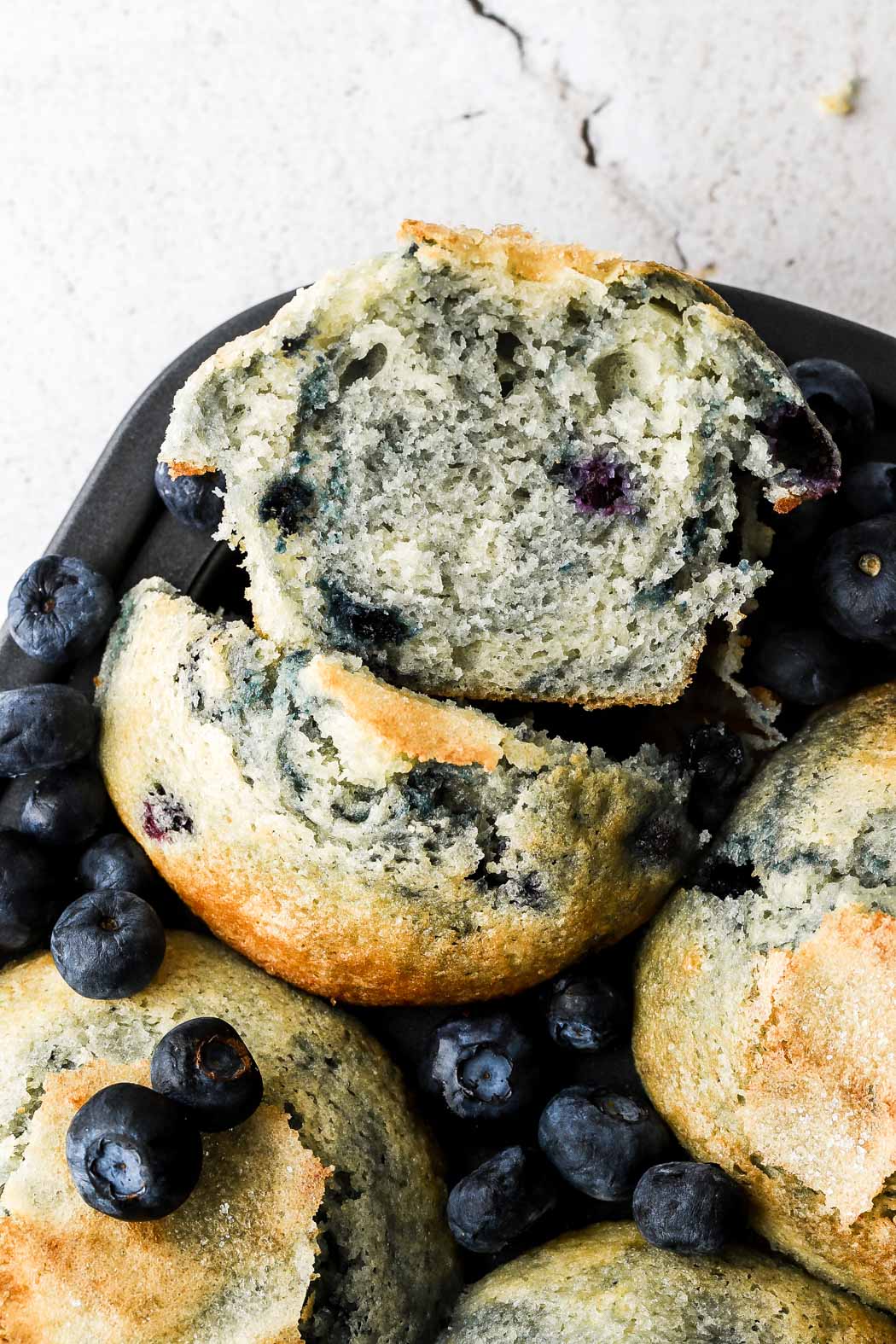 blueberry muffins cut in half