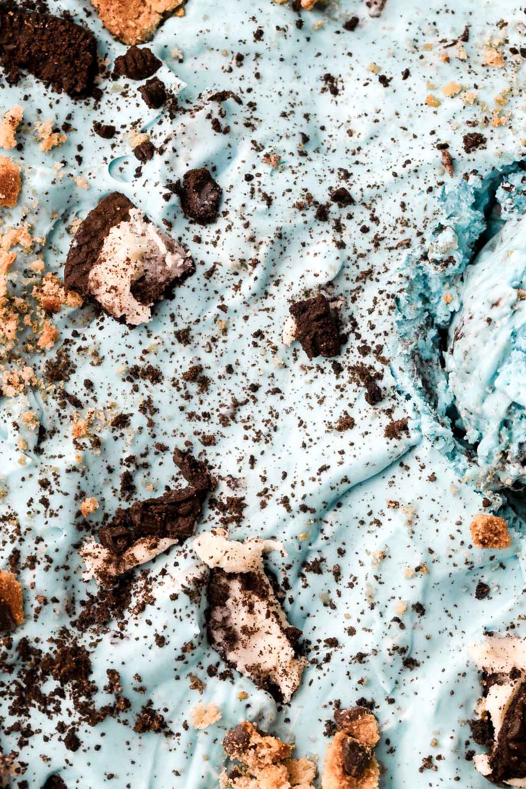blue vanilla ice cream with cookies mixed in