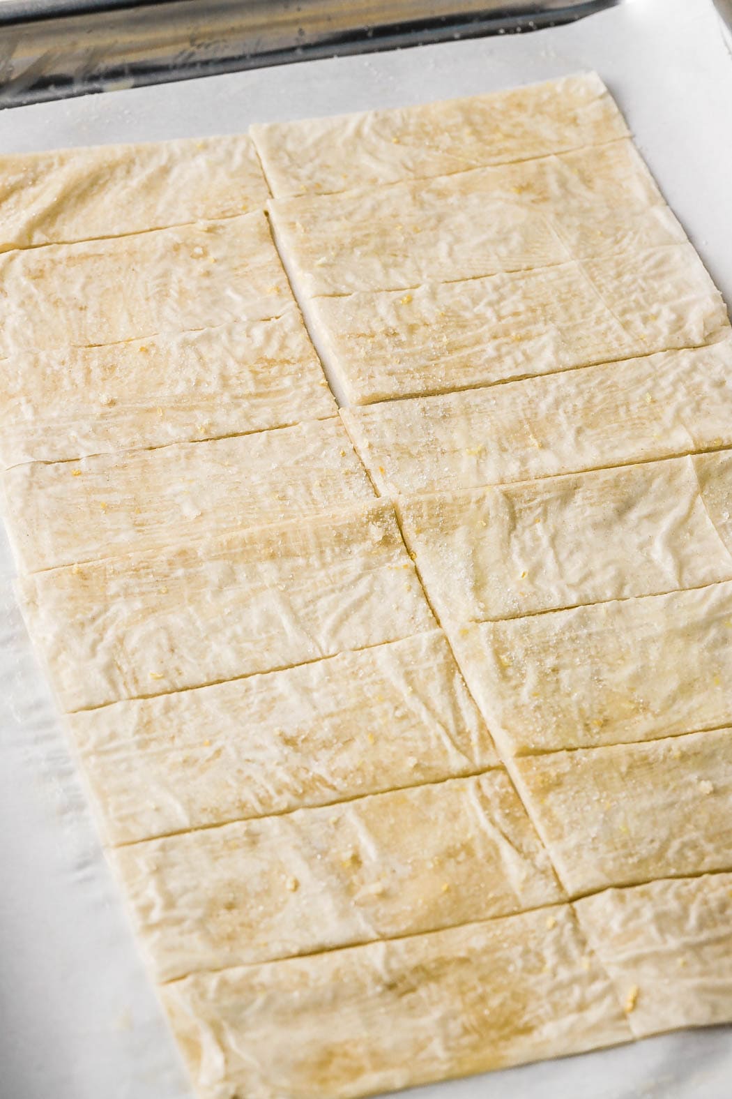 phyllo dough layers buttered up and sliced