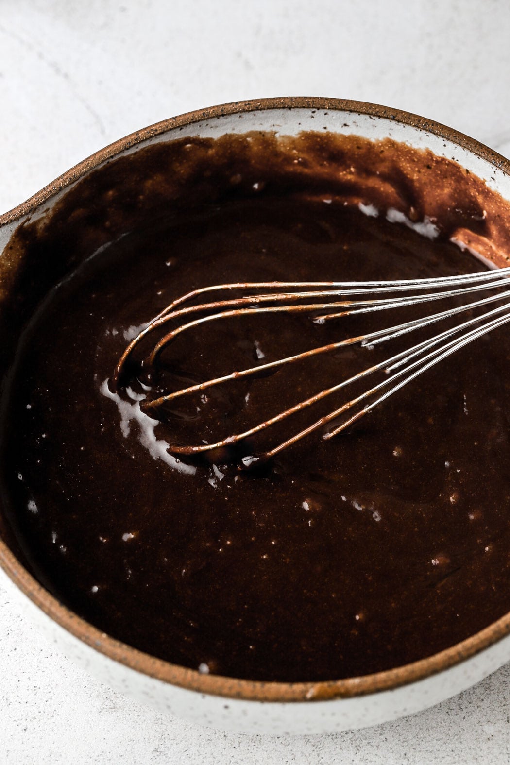 whisk in the melted butter and chocolate