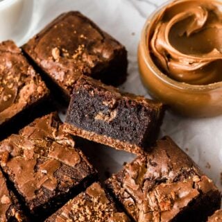 slice of biscoff brownie with cookie butter swirls