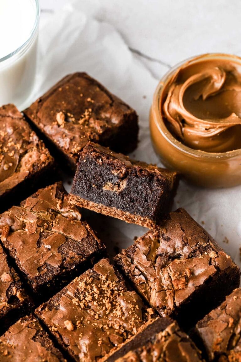 slice of biscoff brownie with cookie butter swirls