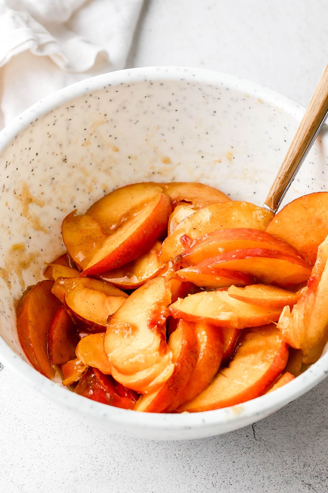 sliced peaches with butter, brown sugar and cinnamon