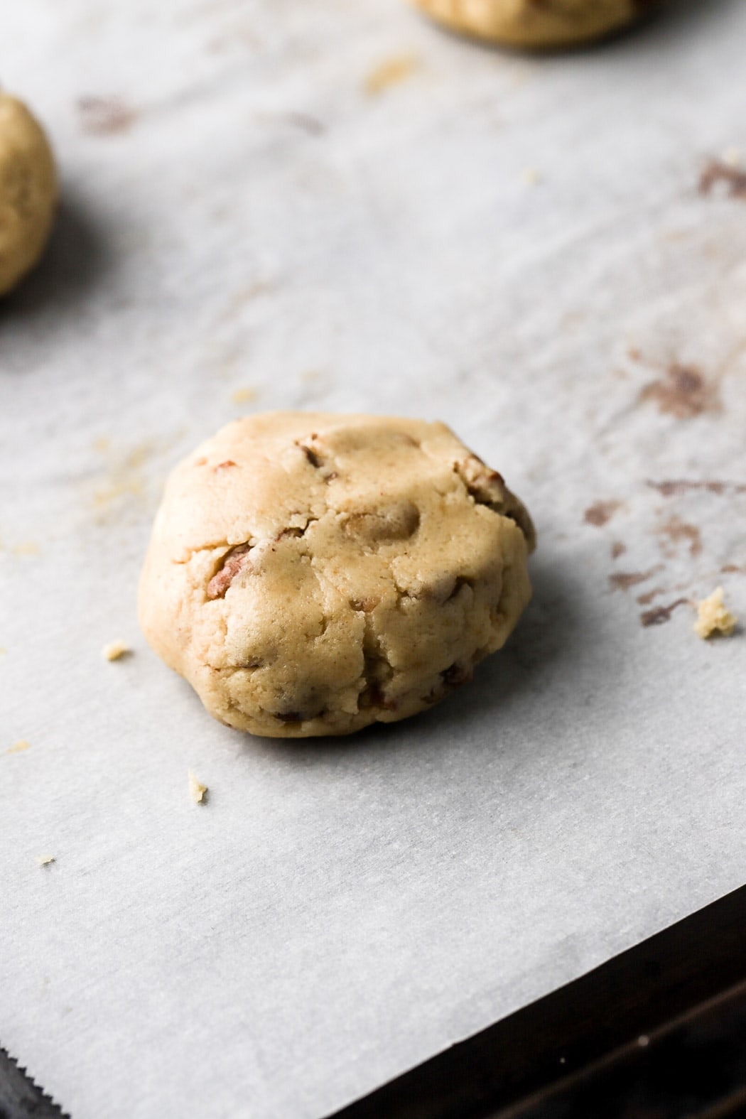 scoop 18 cookie dough balls and flatten them slightly before baking