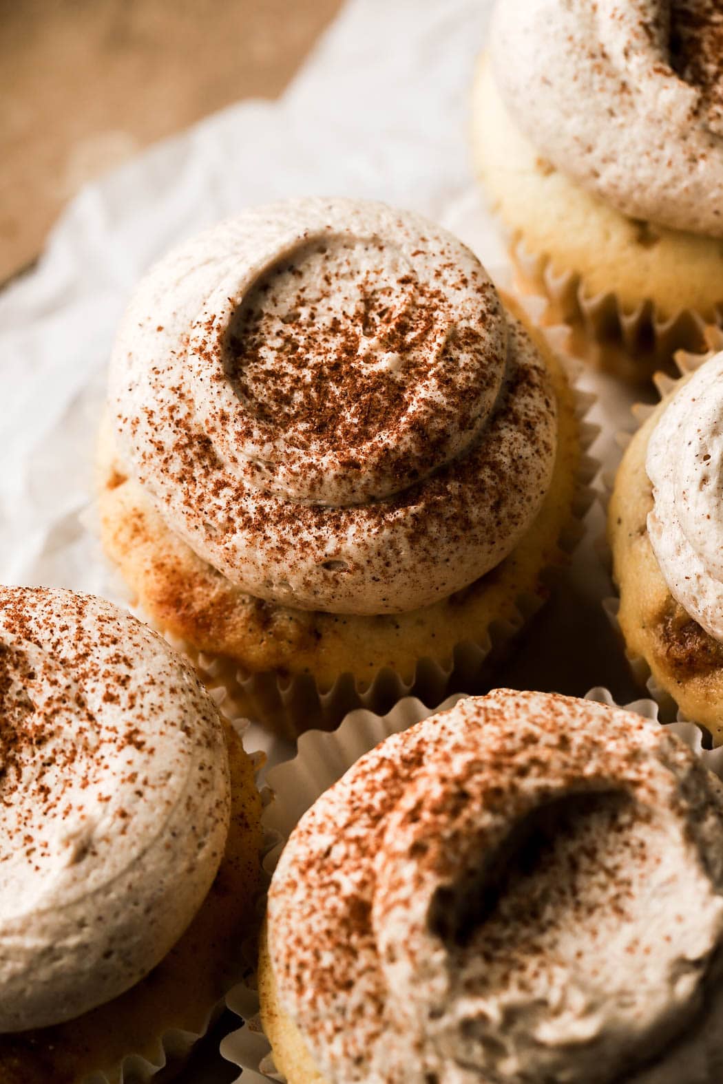 cinnamon cupcakes topped with cinnamon