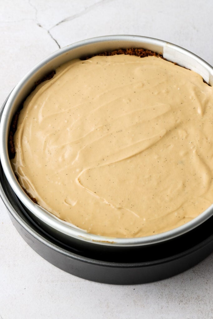 unbaked cheesecake in prepared pan