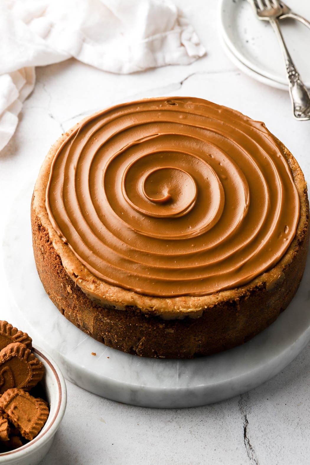 biscoff cheesecake topped with cookie butter swirl