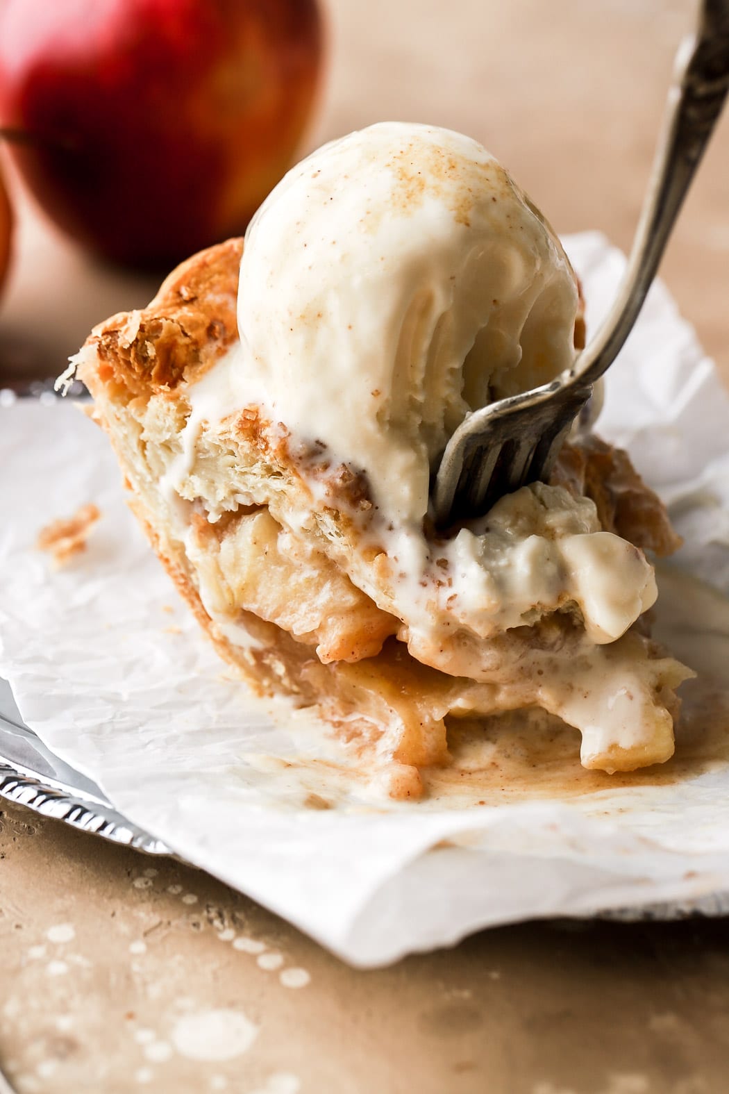 slice of puff pastry apple pie with vanilla ice cream