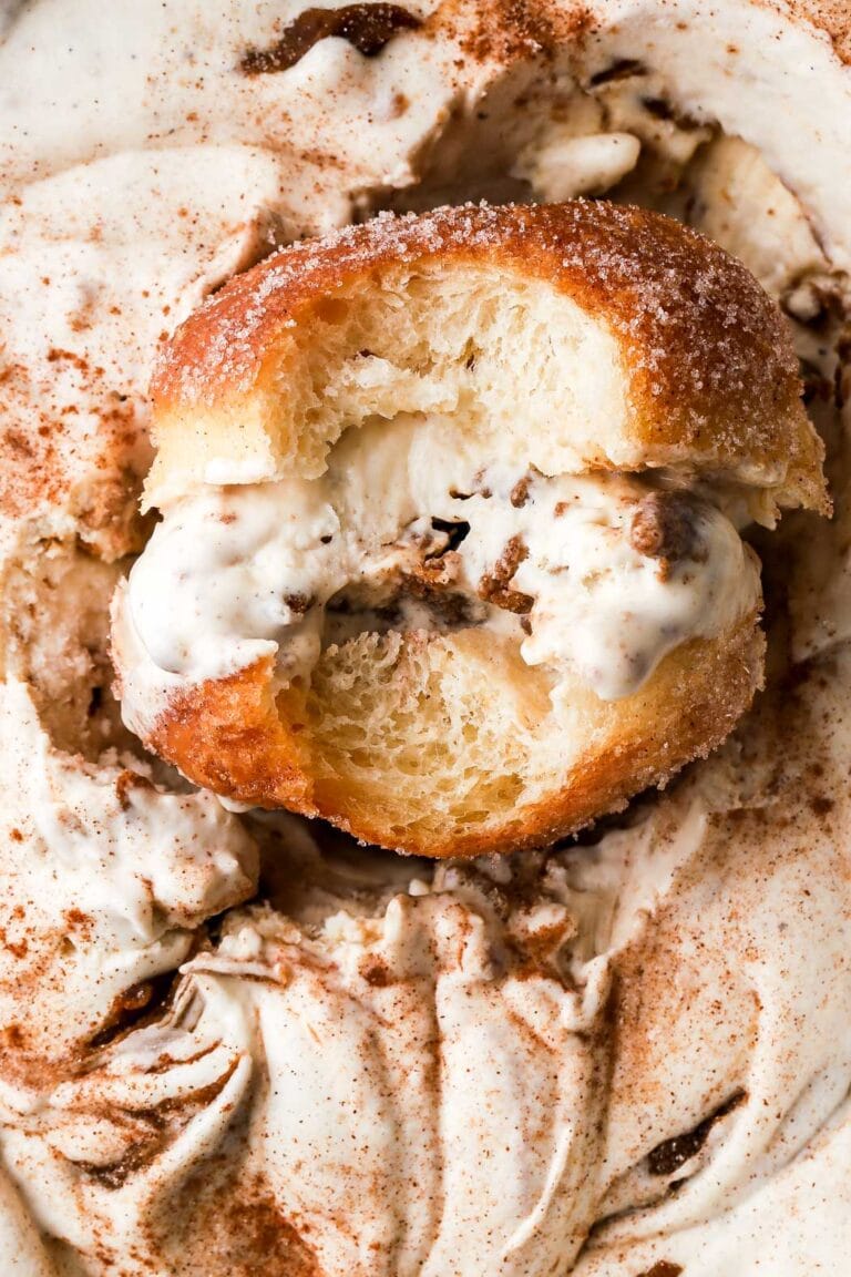 cinnamon roll ice cream between brioche donuts