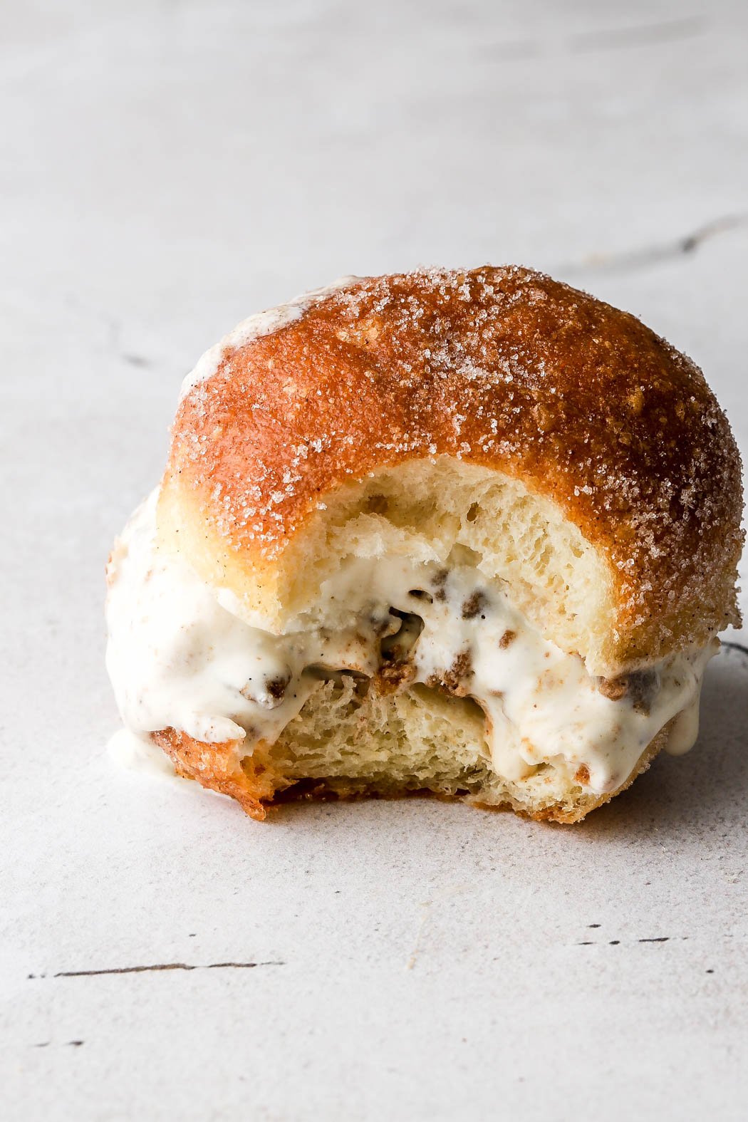cinnamon roll ice cream sandwiched in a donut