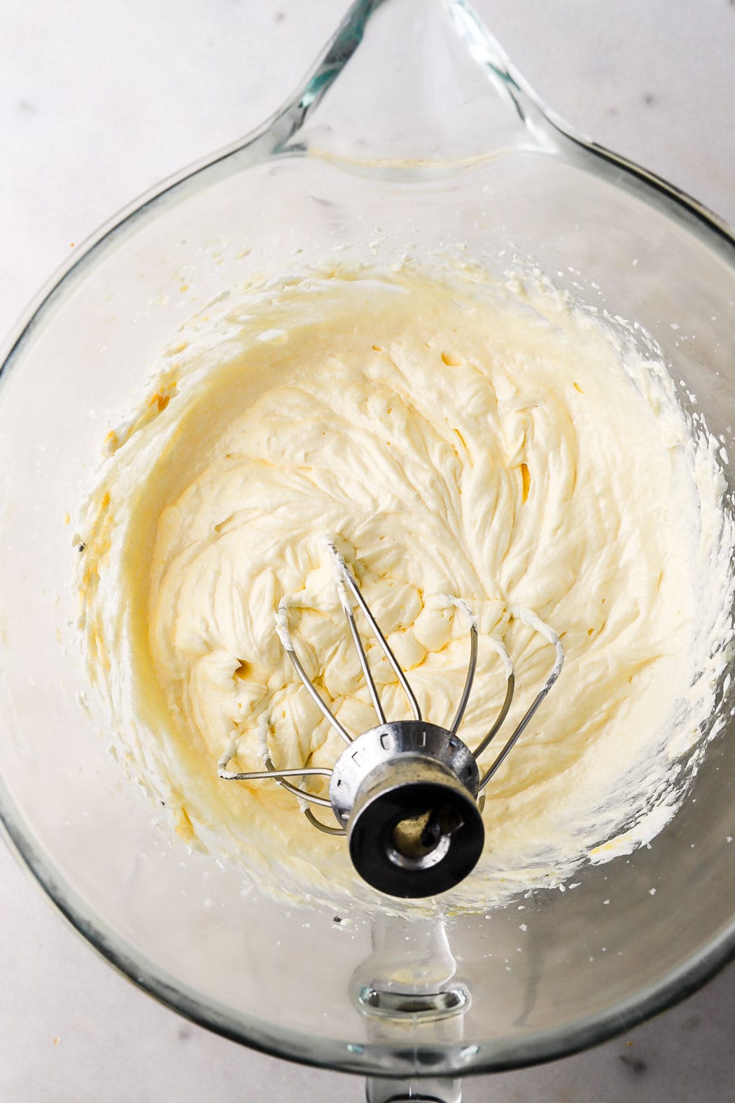 bowl of batter after the eggs and sour cream are added